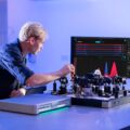An optical engineer using the Moku Time & Frequency Analyzer