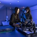 Engineers in an optics lab