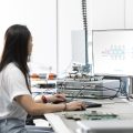 An engineer using the FPGA-based Moku Neural Network for fast, flexible signal analysis